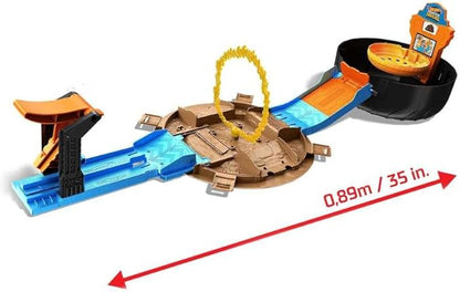 Hot Wheels Toy Monster Trucks Playset, Tire-Shaped Case Transforms into Race Course, 3 Trucks & 4 Cars in 1:64 Scale, Stunt Tire (Amazon Exclusive)