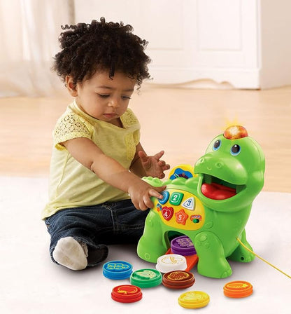 VTech Baby Feed Me Dino | Musical Baby Toy with Numbers, Counting Music & Shapes | Interactive Light Up Toy Suitable from 1, 2, 3 Year Olds Boys & Girls, Green, 27 x 12.3 x 26 cm