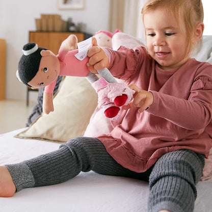 HABA Snug Up Doll Rumbi - 10" Soft Doll with Black Hair and Pink Overalls - Machine Washable for 18 Months and Up